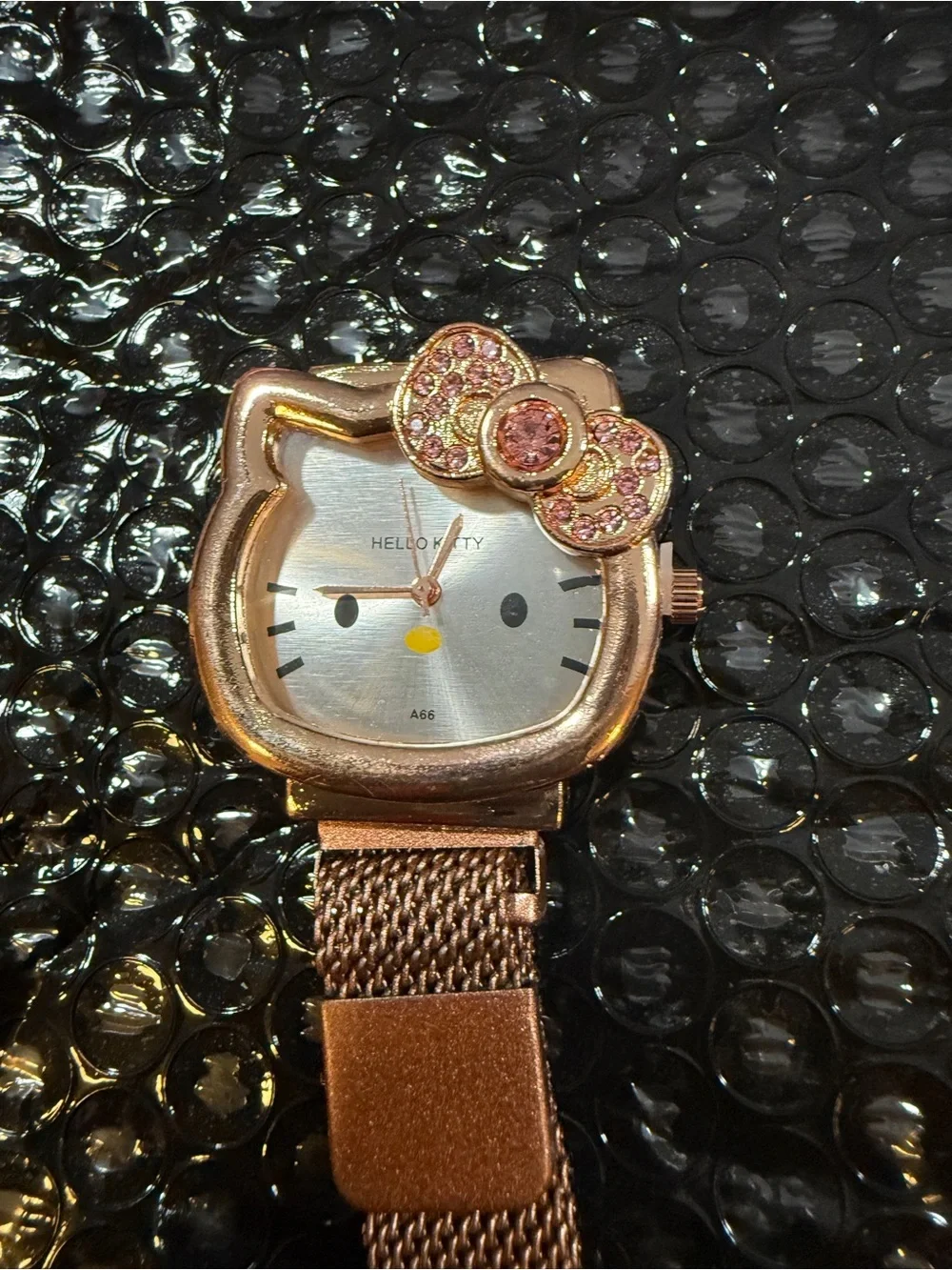 Hello Kitty Rose Gold Tone Mesh Watch with Crystal Bow Accent
